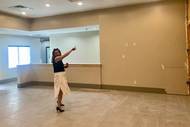 Deputy Housing Director Willa DiTaranto shows an area that is likely to be used as dining space when the former Country Inn & Suites becomes a transitional shelter for unhoused families.
