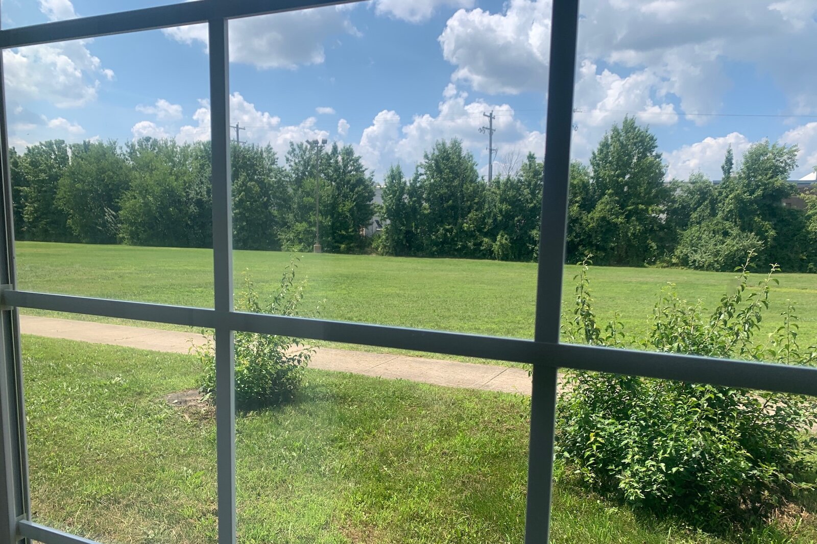 Land at the rear of a former hotel is expected to become a playground area as the property is converted into a transitional shelter for unhoused families.